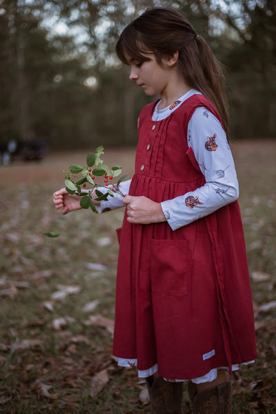 Prairie Girl Pinafore in cranberry