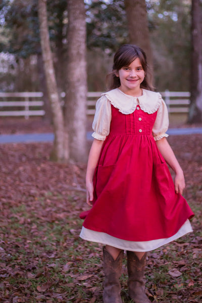 Prairie Girl Pinafore in cranberry